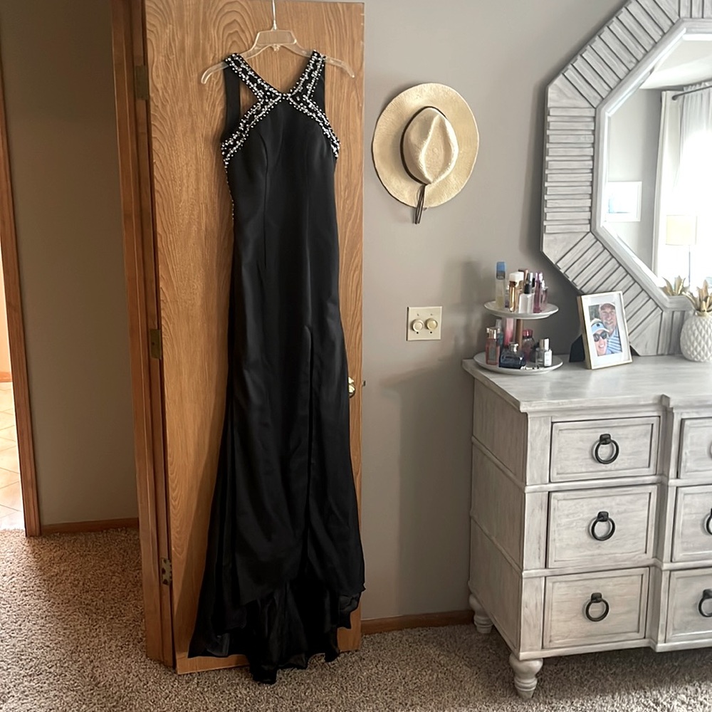 Black formal dress with silver sequins detail.